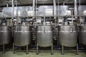 modern-coconut-milk-cellar-with-stainless-steel-tanks_478515-8879